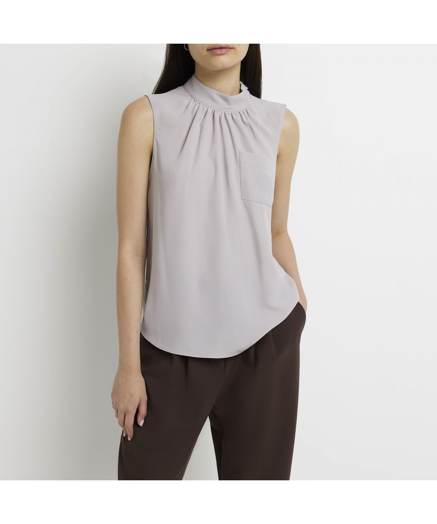 > Brand: River Island> Department: Women> Colour: Grey> Type: T-Shirt> Size Type: Regular> Material Composition: 100% Polyester> Material: Polyester> Pattern: No Pattern> Occasion: Casual> Season: AW22> Sleeve Length: Sleeveless> Neckline: Crew Neck