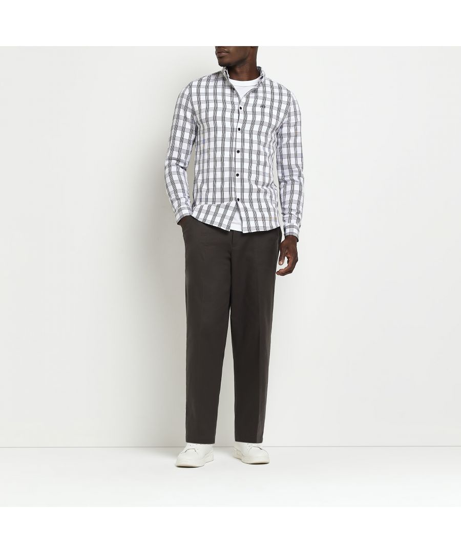> Brand: River Island> Department: Men> Colour: White> Type: Button-Up> Material Composition: 96% Polyester 4% Elastane> Material: Polyester> Neckline: Collared> Sleeve Length: Long Sleeve> Pattern: Check> Occasion: Casual> Size Type: Regular> Season: SS22