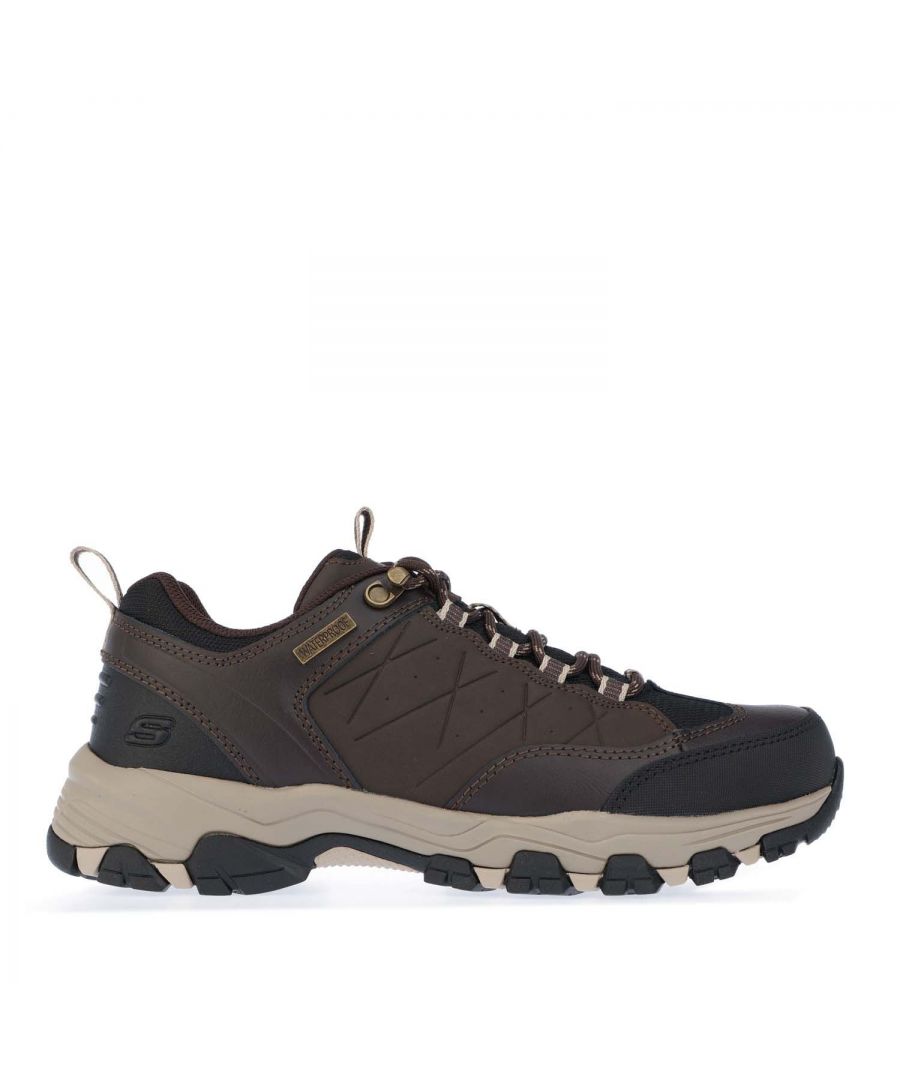 Mens Skechers Selmen Helson Trail Shoes in chocolate.- Synthetic leather upper.- Lace up front with metal top eyelet.- Stitching accents.- Waterproof seam sealed design.- Fabric heel and tongue pull on loops.- Synthetic toe and heel bumper overlays.- Front  side and heel leather overlay detail with stitched edging trim.- Side leather panels with embossed detail and perforation accents.- SKECHERS logo detail on tongue.- Relaxed Fit® design for roomy comfortable fit.- Air Cooled Memory Foam full length cushioned comfort insole.- Shock absorbing midsole.- Rubber toe bumper front.- Leather upper  Textile Lining  Synthetic Sole.- Ref: 66282CHOC
