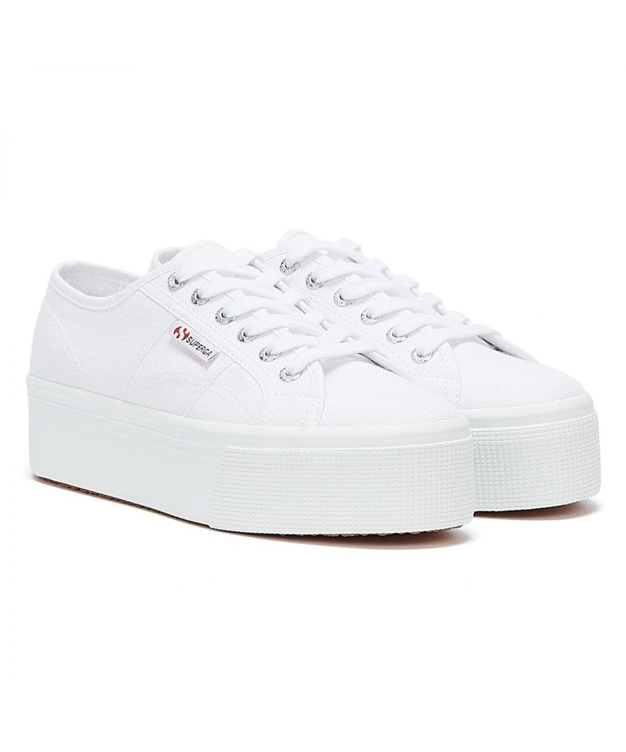 The 2790 is Superga's iconic platform model. Canvas uppers are made from extra-strong, fully breathable pure cotton. A chunky vulcanised rubber sole provides lift as well as grip. Certified vegan.