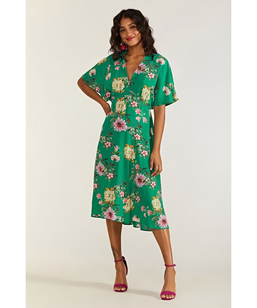 Inspired by Japanese botanical gardens, this Floral Yumi Kimono Midi Dress is perfect for the warmer months. Crafted from light and flowy fabric that drapes to the knee, the material tapers under the bust to create a relaxed empire line. The short kimono sleeves add movement, whilst the vivid green and pink palette makes it an excellent choice for a summer wedding. Time to RSVP…