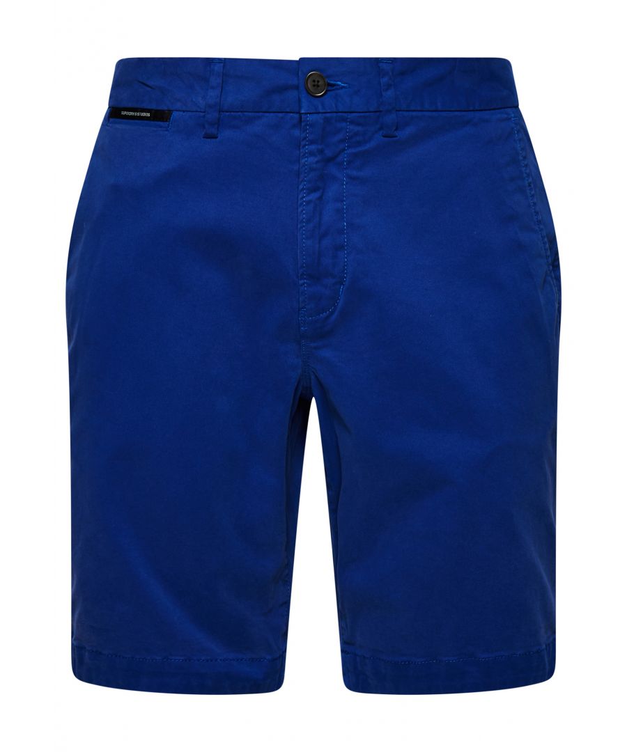 Chino shorts are a classic for a reason. Their tailored look makes any outfit feel complete, and our core chino shorts are no exception. It features a minimalist design and a wide range of colours so you can express yourself how you see fit.Slim fit – designed to fit closer to the body for a more tailored lookButton and zip fasteningBelt loopsTwo waist pocketsCoin pocketTwo-button back pocketsClassic Superdry patchesMade with organic cotton grown using natural rather than chemical pesticides and fertilisers. The healthier soil this creates uses up to 80% less water which is better for our planet and for the farmers who grow it.