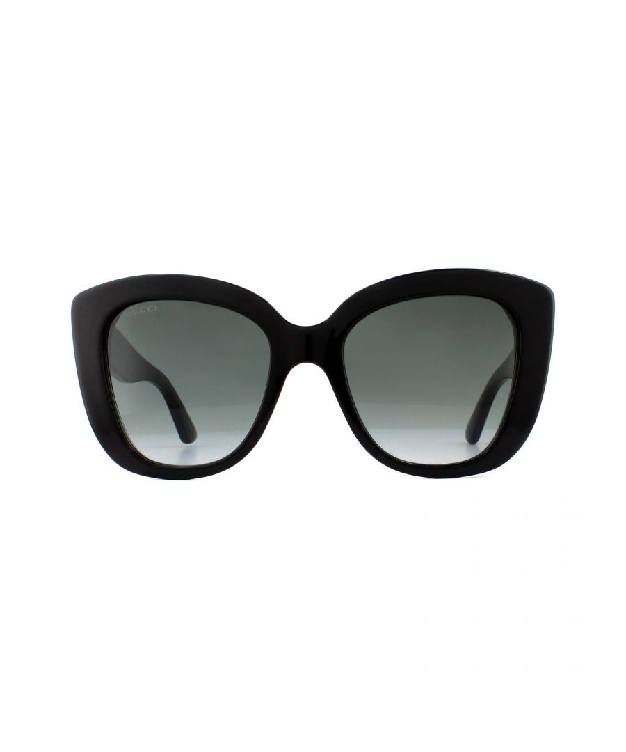 Gucci Sunglasses GG0327S 001 Black Grey Gradient are a bold acetate cat eye style for women. Embellished with the interlocking GG logo on each temple. These sunglasses are guaranteed to make a statement this summer!