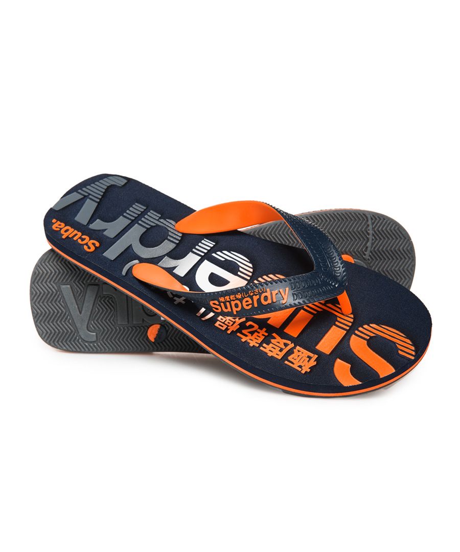 Superdry men's Scuba faded logo flip flops. Step into summer in style with the Scuba faded logo flip flops, featuring faded logo detailing on the sole and textured straps with logo detailing.S - UK 6-7, EU 40-41, US 7-8M - UK 8-9, EU 42-43, US 9-10L - UK 10-11, EU 44-45, US 11-12XL - UK 12-13, EU 46-47, US 13-14