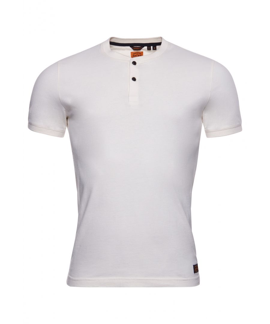 Great for layering the Short Sleeved Henley T-shirt features a classic Henley collar, button fastening, short sleeves and a signature logo patch.Slim fit – designed to fit closer to the body for a more tailored lookHenley collarButton fasteningShort sleevesRibbed collarSignature logo patchMade with Organic Cotton - which is grown without the use of artificial chemicals, leading to better soil, 60-90% less water used, and better health for farmers.