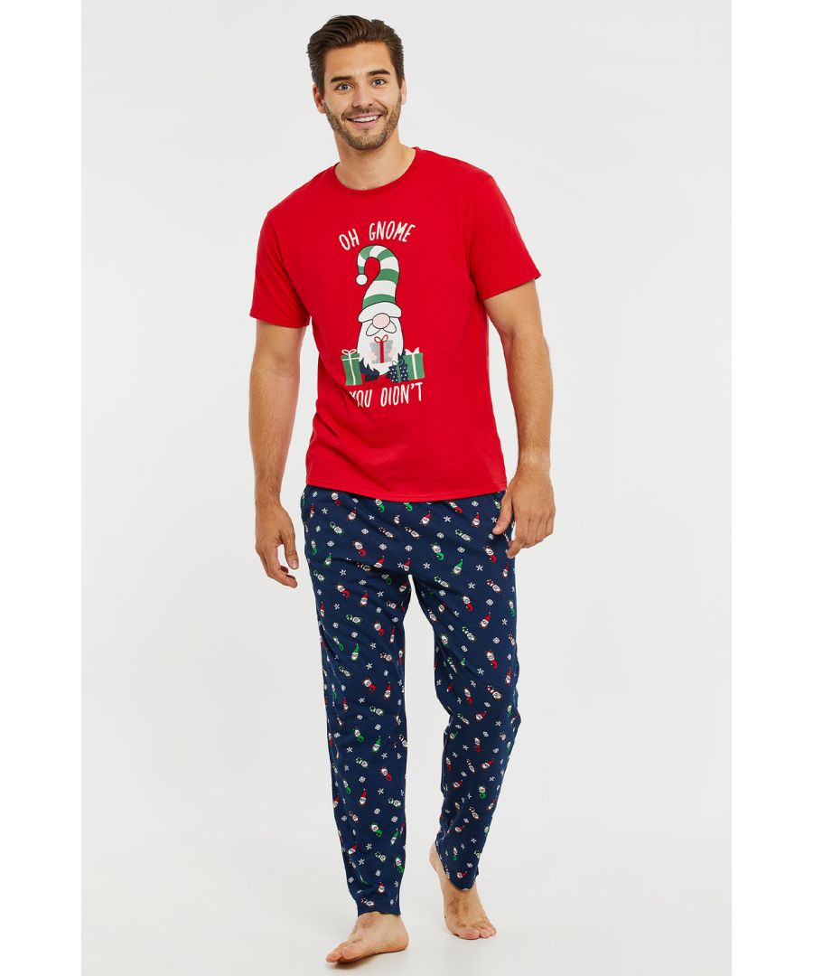 Get in the festive spirit with this cotton pyjama set from Threadbare featuring a short sleeve top with gnome front print and printed, straight leg long bottoms with elasticated waistband, drawcord and two pockets. The soft cotton fabric ensures a comfortable feel and easy washing. Other designs and styles available.
