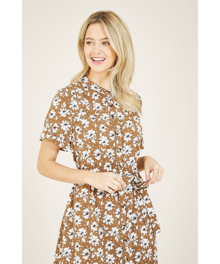 Looking for an easy throw-on-and-go piece: as effortlessly stylish as it is practical? Our Yumi Floral Shirt Dress fits the bill. Crafted from lightweight fabric with a silky-soft feel, it's designed with a classic button-up shape that sits above the knee. Around the waist, a tie enhances your figure, while the bold floral print makes it an excellent choice for the new season. And as for the pockets - they're a bonus.  100% Polyester Machine Wash At 30 Length is 98CM