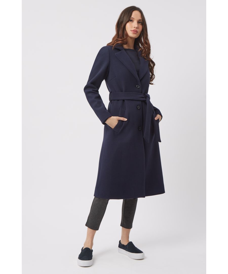 This tailored coat is designed to fall to a slim-fitting, mid-length silhouette with a buttoned front, a tie belt and slanted pockets at the side. Layer it over a silky blouse and tailored trousers for workwear.