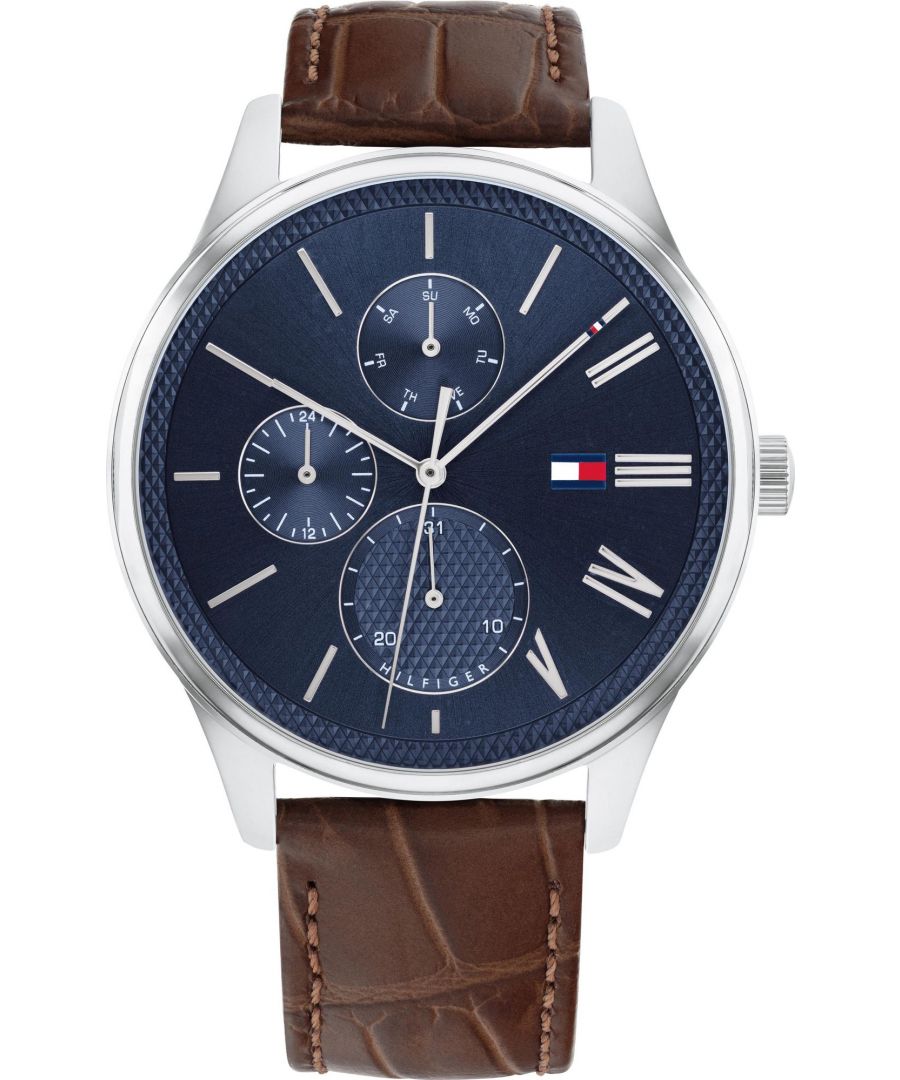 This Tommy Hilfiger Damon Multi Dial Watch for Men is the perfect timepiece to wear or to gift. It's Silver 44 mm Round case combined with the comfortable Brown Leather watch band will ensure you enjoy this stunning timepiece without any compromise. Operated by a high quality Quartz movement and water resistant to 5 bars, your watch will keep ticking. Get all the comfort with this fashionable croco-embossed leather band, perfect for every occasion  -The watch has a calendar function: Day-Date, 24-hour Display High quality 21 cm length and 20 mm width Brown Leather strap with a Buckle Case diameter: 44 mm,case thickness: 10 mm, case colour: Silver and dial colour: Blue