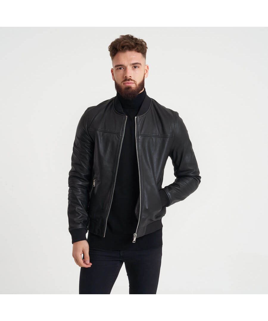 This real leather bomber jacket from BARNEYS ORIGINALS features elasticated cuffs and waistline. The leather features a subtle textured surface that ages gracefully with wear.