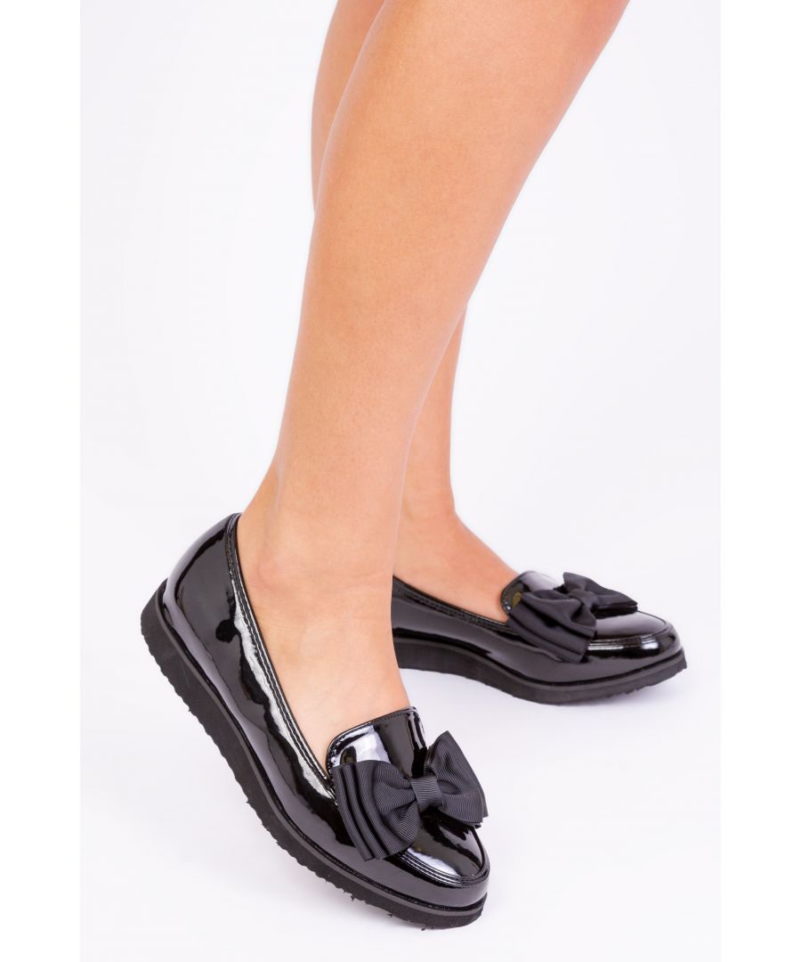 Women's platform flat slider featuring a bow on front