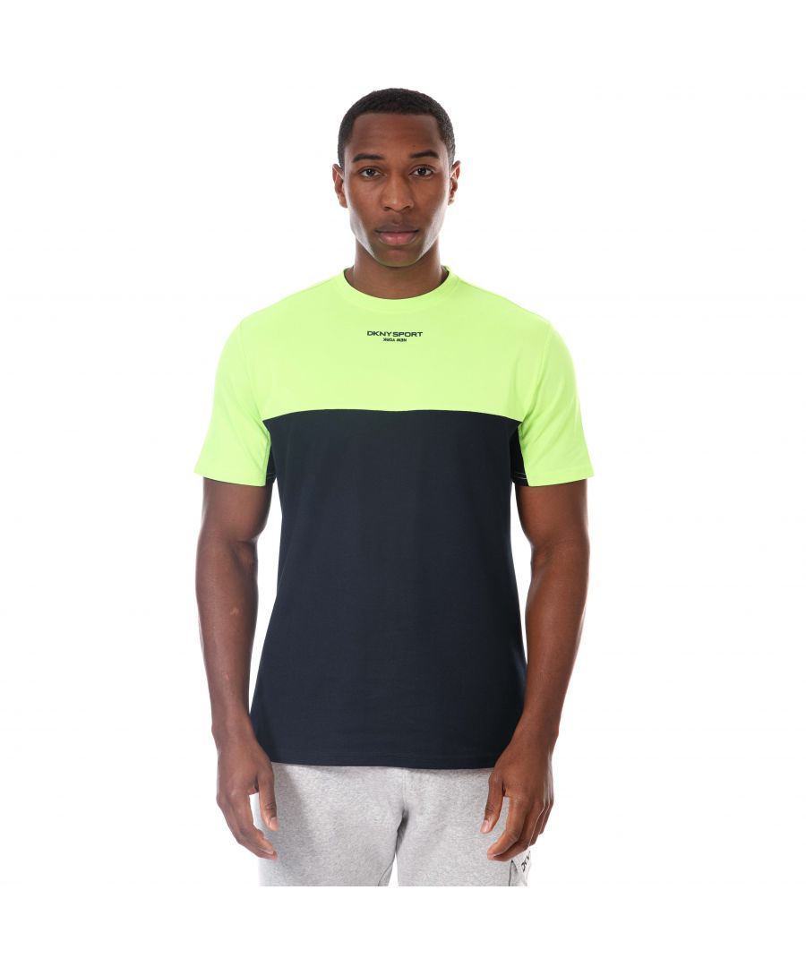 Mens DKNY Greenwood Colour Block Pique T- Shirt in navy.- Crew neckline.- Short sleeves.- Colour block design.- Inside back neck branded taping with rubberised print.- Printed DKNY Sport logo on chest.- Signature woven flag label to lower left side seam.- Lightweight  quick-drying  moisture-wicking- Regular fit.- 52% Cotton  45% Recycled Polyester  3% Spandex.- Ref:DKSMS22011NAV