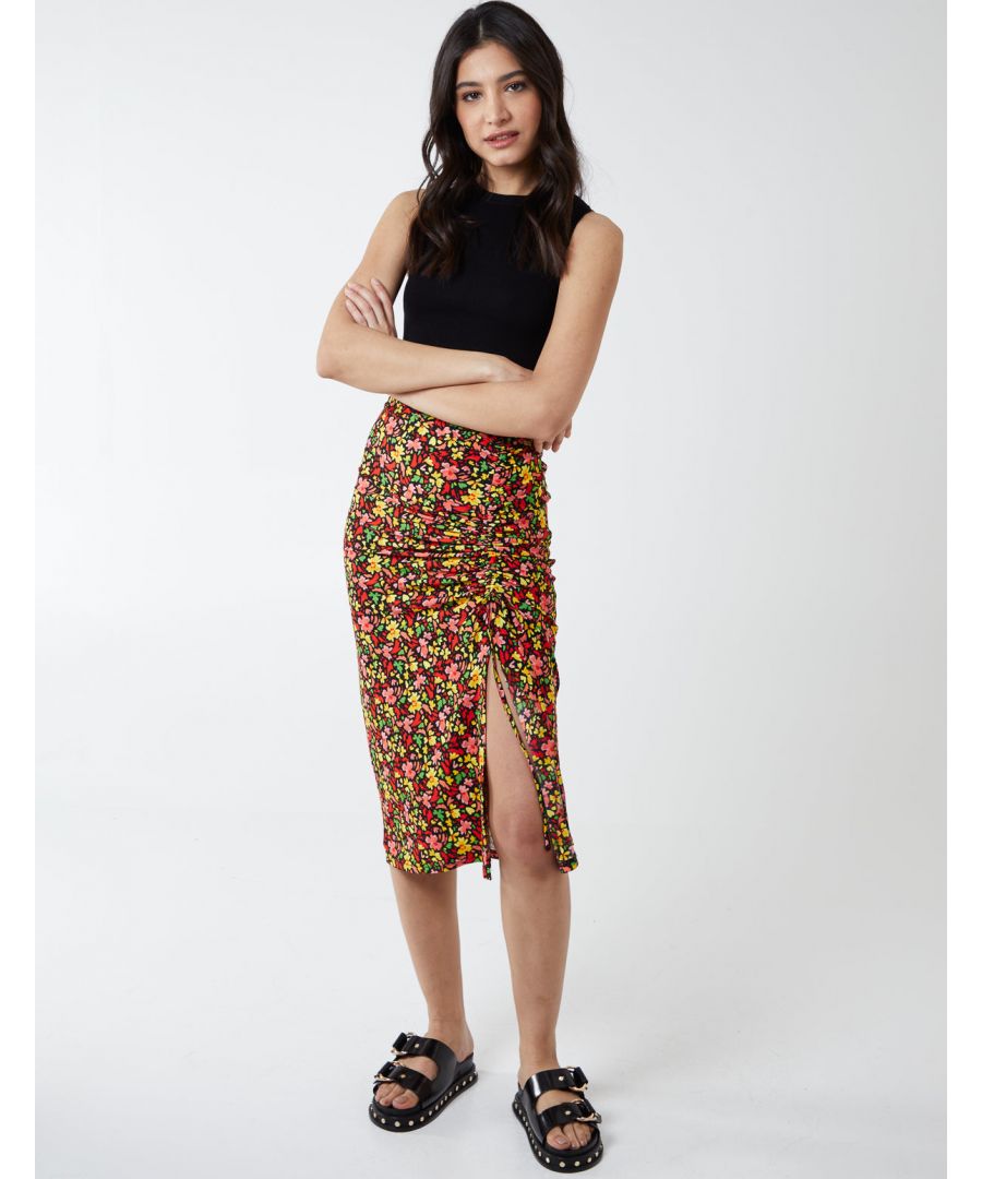Make a stand out statement in this killer midi skirt. Featuring an abstract floral print and ruched front. Team it with a white summery top and sandals to complete the look.\n92% Polyester, 8% Elastane. Machine washable. Elasticated waistband. Unfastened. Model wears size 8. Model height: 5'9.5