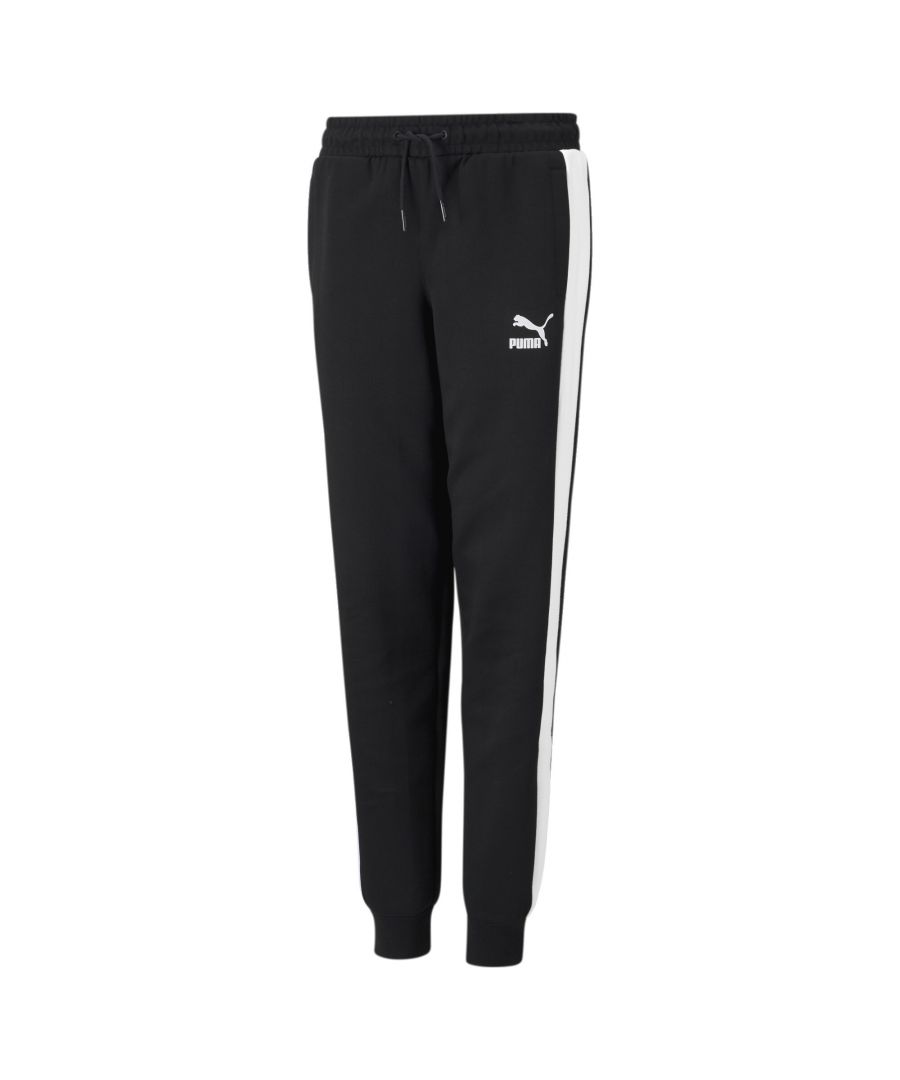 PRODUCT STORY A faithful replica of an Archive original, these track pants have lost none of their iconic status. With a wide T7 stripe down the leg, a tapered cut and cuffed ankles, these authentic bottoms are bursting with retro vibes. FEATURES & BENEFITS: By buying cotton products from PUMA, you’re supporting more sustainable cotton farming. Recycled Content: Made with at least 20% recycled material as a step toward a better future DETAILS: Regular fitSide seam pocketsElasticated cuffsElastic waistband with external drawcord for customised comfortT7 panel inserts down the legPUMA Archive No. 1 Logo rubber print at left legCotton and recycled polyester