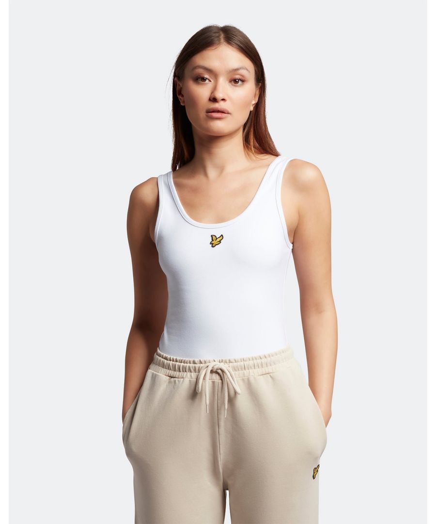 The women's Lyle & Scott Bodysuit is a versatile and understated piece. Perfect for heading into warmer days, the bodysuit is easy to pair with casual pieces, like jeans and joggers, for an effortlessly stylish look.