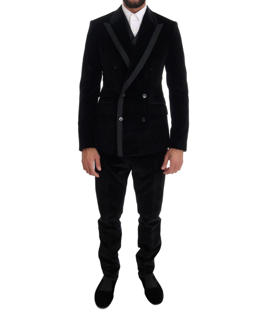 Dolce & Gabbana Absoluut prachtig, 100% Authentiek, gloednieuw met tags Dolce & Gabbana Pak. Kleur: Zwart Stijl: Double breasted 3-delig pak omvat blazer, vest, en broek Sluiting: Twee knoopsluiting Pasvorm: Slim Fit Twee binnenzakken Een open vent in de rug Vest heeft volledige knoopsluiting en een verstelbare riem terug 3-weg broek ritssluiting Made in Italy Zeer exclusief en hoog vakmanschap Materiaal: 91% Katoen, 7% Polyester, 2% Zijde Voering: 50% Rayon, 50% Polyester