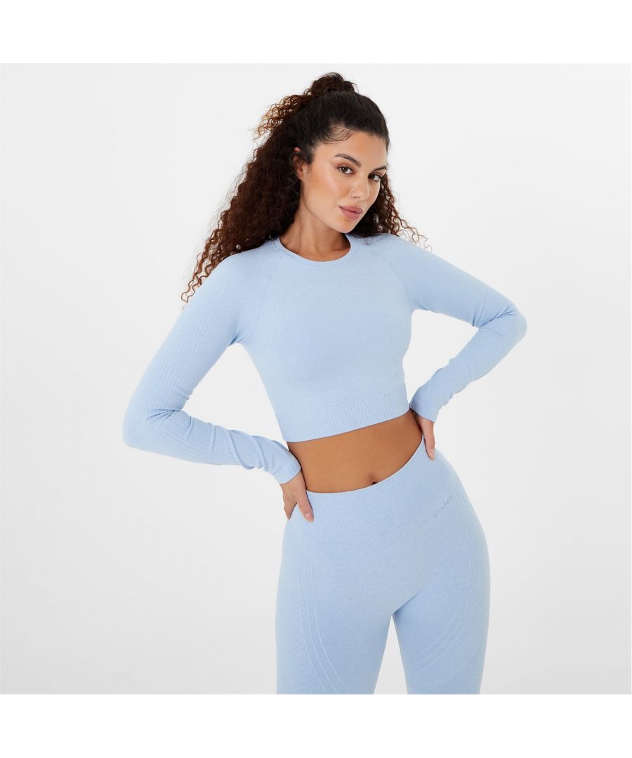 USA Pro Long Sleeve Seamless Crop Top - This USA Pro long sleeve seamless crop top is crafted with long sleeves and a crew neck for a truly classic sportswear look. It features flat lock seams for comfort and is a lightweight construction. This staple is designed with a signature logo and is complete with USA Pro branding. So whatever workout you have planned, look ready and feel confident in our must-have fit. > Seamless > Long sleeves > Crew neckline > Flat seams > Branding > Cropped design > Marl: 48% nylon, 38% polyester, 13% elastane > Plain: 90% nylon, 10% elastane > Machine washable