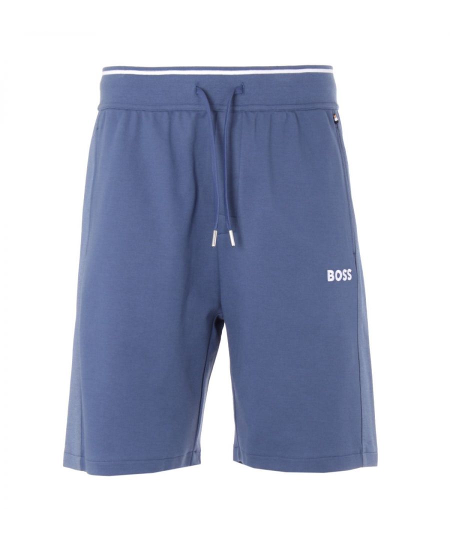 These modern tracksuit shorts from BOSS are perfect for elevating your a downtime styling. Crafted from a cotton blend piqué, providing comfort and breathability. Featuring an elasticated drawstring waist, side seam pockets and contrast inserts at the side seams for a sporty look. Finished with the iconic BOSS logo embroidered at the left thigh. Regular Fit, Cotton Blend Pique, Elasticated Drawstring Waist, Twin Side Seam Pockets, Contrast Inserts, BOSS Branding. Style & Fit: Regular Fit, Fits True to Size. Composition & Care: 70% Cotton, 30% Polyester, Machine Wash.