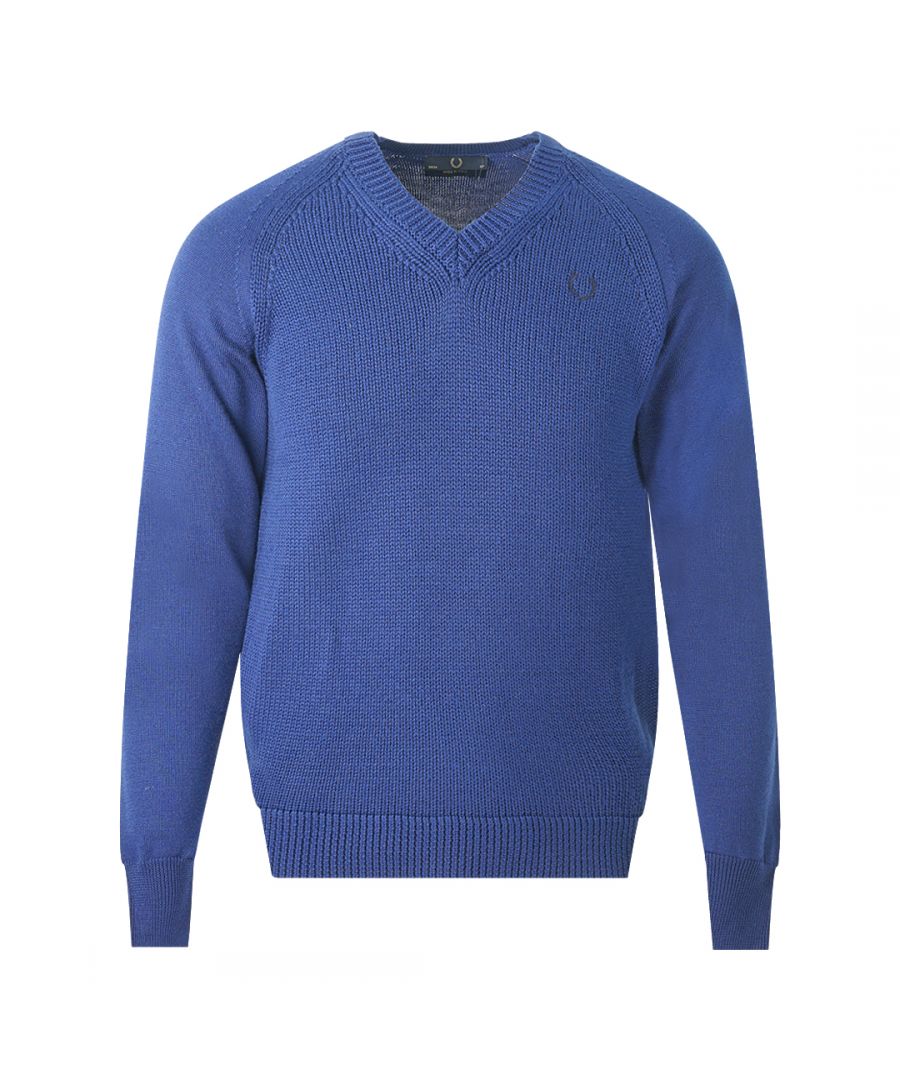 Fred Perry V-Neck Cable Blue Jumper. Fred Perry V-Neck Cable Blue Jumper. 100% Wool. V-Neck. Elasticated Sleeve and Hem. Style Code: K6148 143