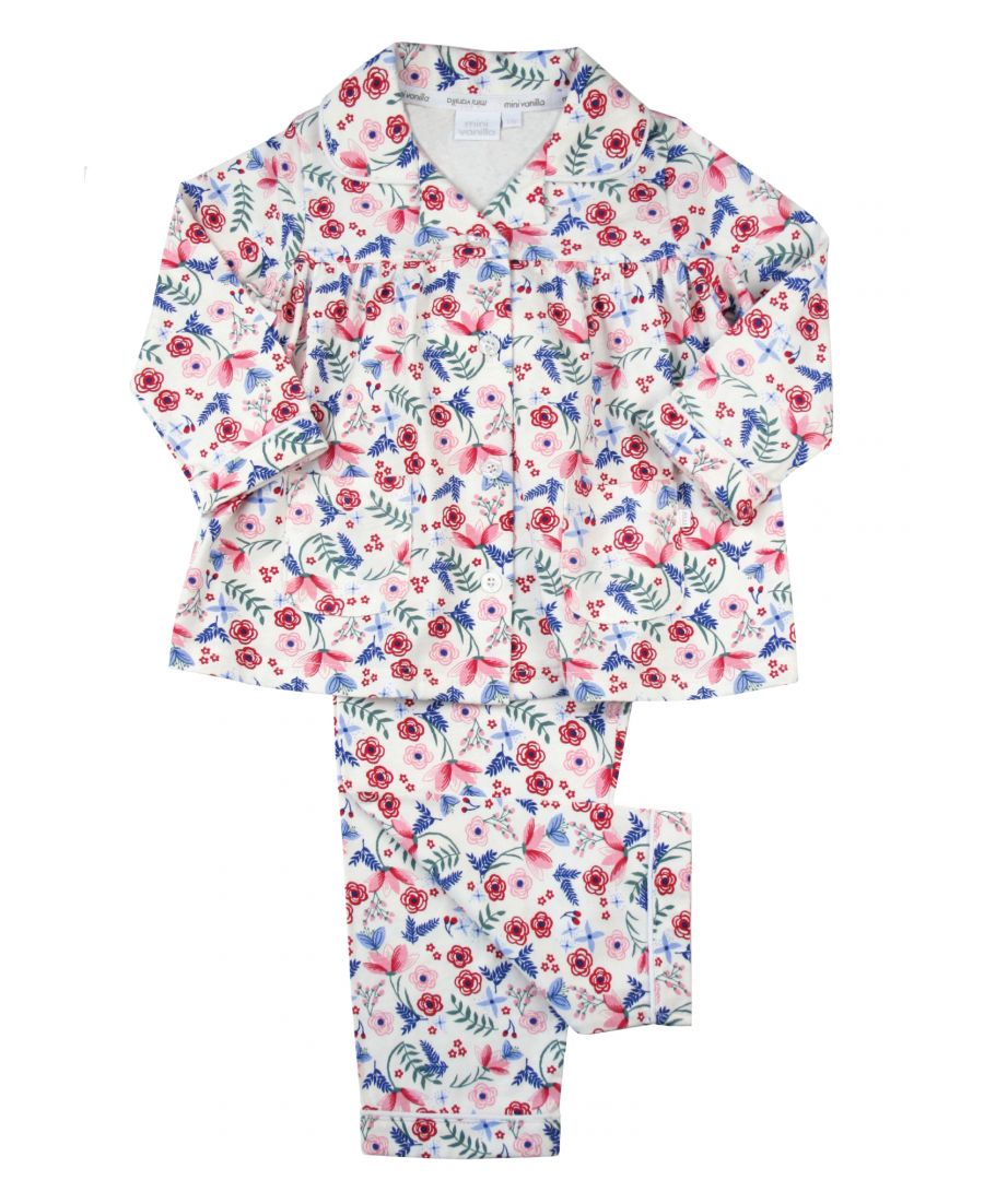 Winter Floral Cotton Traditional Pyjamas for Girls\nThis pretty winter floral print is sure to inspire dreams. These girls jersey pyjamas set is made from a brushed super-soft 100% cotton jersey - to keep you warm in the cool winter nights. The set is trimmed with Mini Vanilla back neck tape, a MV tab, revere collar and fastens at the front with Mini Vanilla engraved buttons.  Pockets too - to keep all essentials - Polly pocket, lego even night time snacks! Fully elasticated at the waist and a frilled hem make for very comfy trousers. \n\nSold as a Pyjama set\nFabric 100% cotton \nFire Warning : KEEP AWAY FROM FIRE AND FLAMES.\nWash Care Instructions : Machine wash inside out, do not soak, wash dark      colours separately, do not iron trims. Save energy and wash at 30 degrees.\nDo not tumble dry