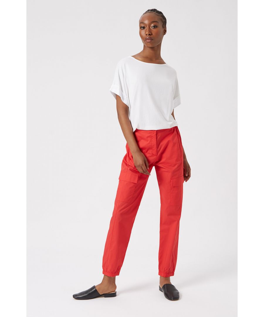 Crafted in a light, crisp, Italian cotton, these cargo trousers have all the hallmarks of an easy, carefree yet chic summer holiday must-have. Featuring multiple convenient pockets and with the added benefit of an elasticated back and finished with an elasticated ankle, perfect for pairs with a loose fit T-shirt and flats. \nTapered fit cargo trousers, Multi pockets, Elasticated hem, falls above the ankle, Elasticated waist, Button & zip fly fastening, 100% cotton, Machine wash 30oC, Model wears size 8, Model height 5ft 9inches, Made in Italy.