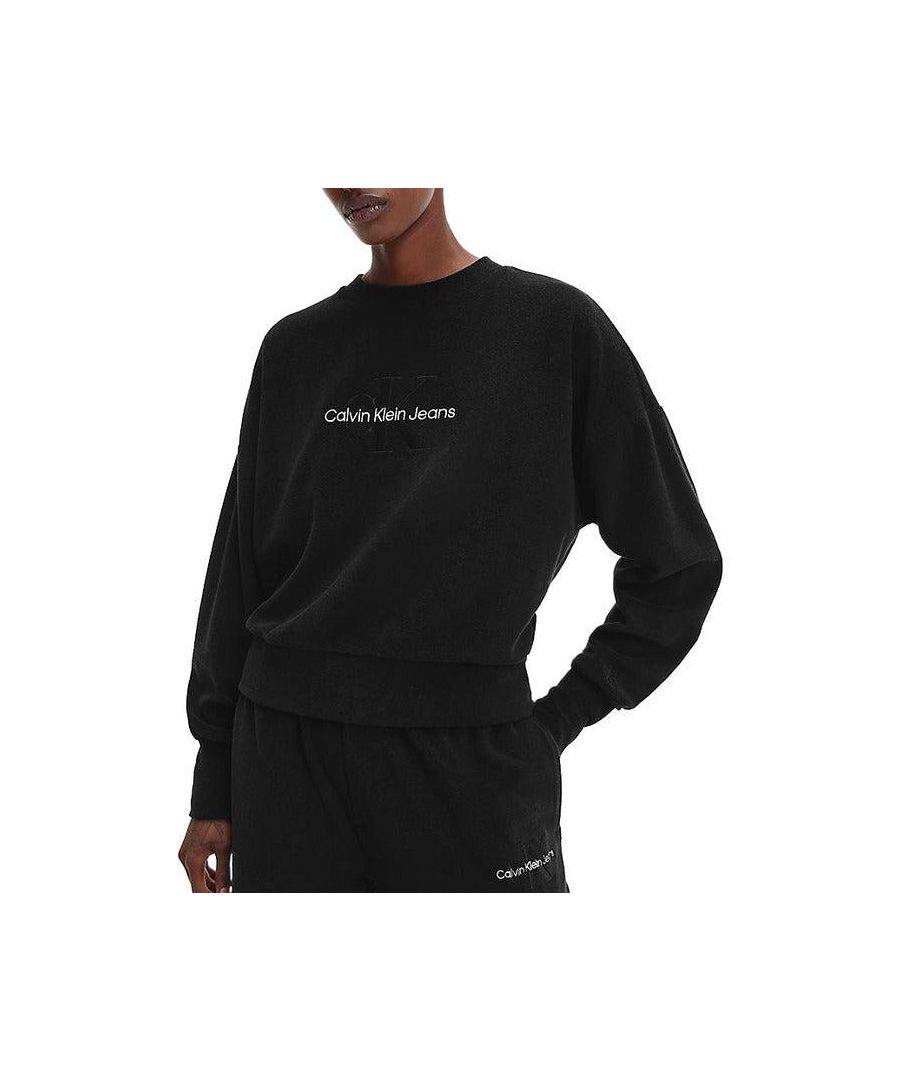 Brand: Calvin Klein Jeans\nGender: Women\nType: Sweatshirts\nSeason: Fall/Winter\n\nPRODUCT DETAIL\n• Color: black\n• Pattern: print\n• Sleeves: long\n• Neckline: round neck\n\nCOMPOSITION AND MATERIAL\n• Composition: -48% cotton -32% modal -20% polyester \n•  Washing: machine wash at 30°