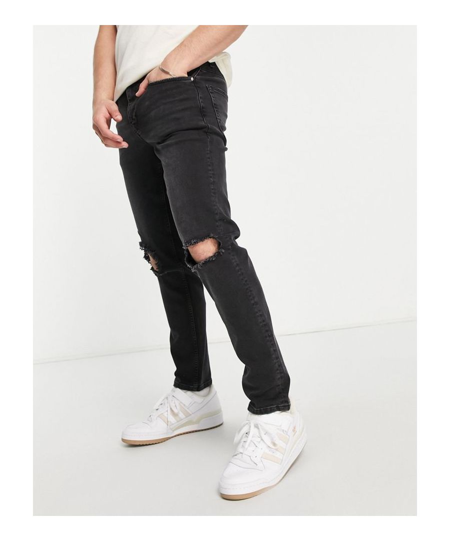 Slim jeans by ASOS DESIGN Belt loops Zip fly Five pockets Ripped knees Slim fit Sold By: Asos