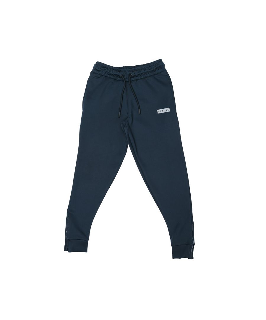 Junior Boys Rascal Pop Linea Track Pants in navy.- Drawcord for adjustment.- Two side pockets.- Rascal branding to left leg.- Fading stripe to side.- Stretchy waist for pull on ease.- Ribbed ankle.- Ankle zips.- Regular fit.- 91% Polyester  9% Elastane. Machine wash at 30 degrees.- Ref: RCLTJ10823A