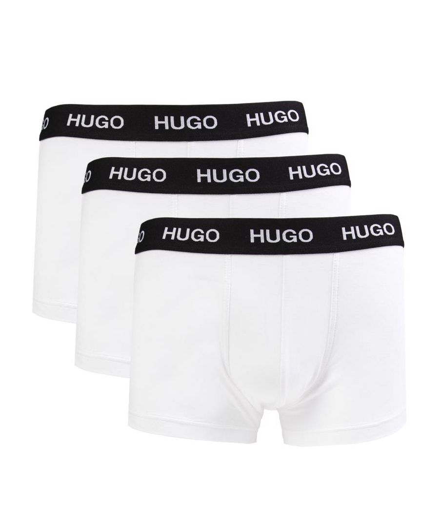 Mens white Hugo 3 pack trunk lounge wear, manufactured with cotton. Featuring: triple pack, branded waistband, medium fits 32