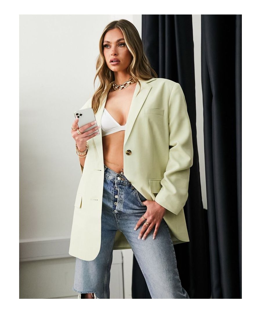 Blazer by ASOS DESIGN Serving business chic Notch lapels Padded shoulders Two-button fastening Pocket details Relaxed dad fit  Sold By: Asos