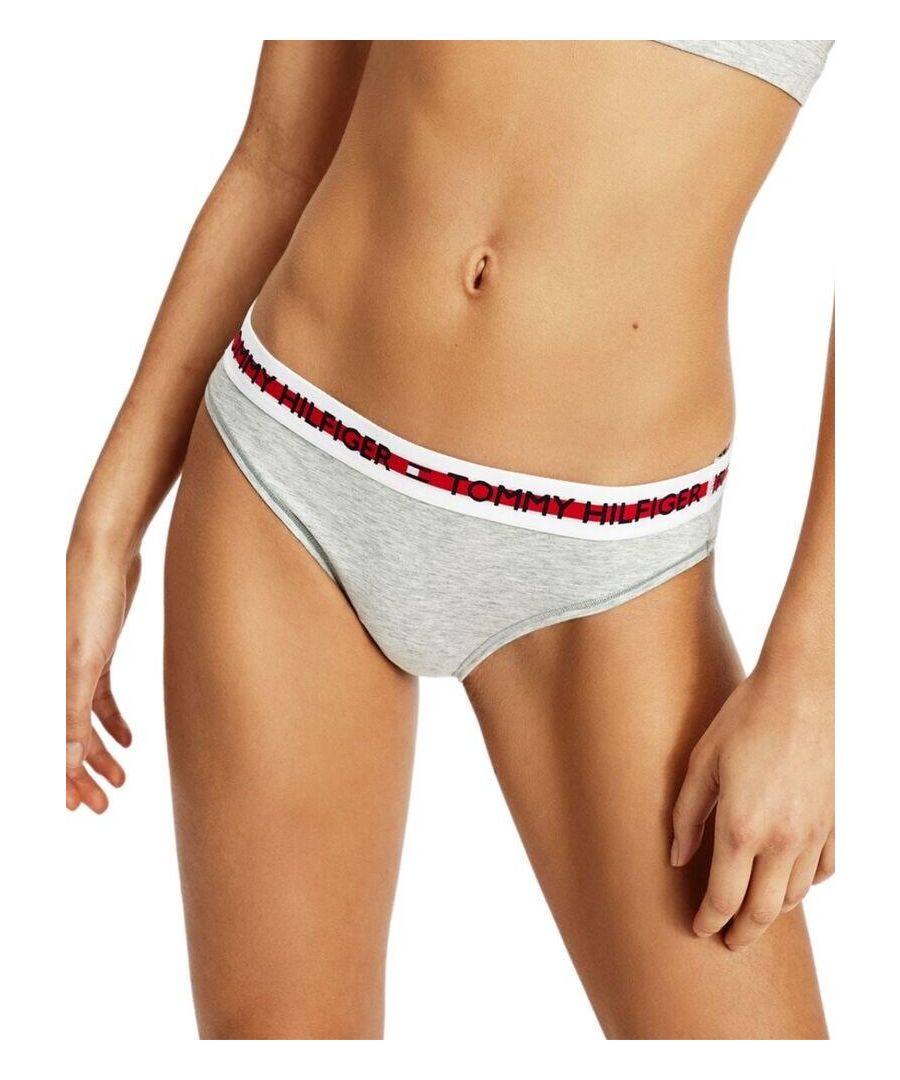 Add this classic style Tommy Hilfiger brief to your lingerie collection. They feature the signature bright repeat logo tape waistband and great rear coverage. These briefs are super comfortable with an organic cotton blend as well as a stretchy waistband for a perfect fit to your body. Feel confident in wearing these under any outfit, any day.\n\nClassic style briefs\nRepeat logo tape stretchy waistband\nModerate rear coverage\nComposition:- 53% Organic Cotton | 35% Modal | 12% Elastane\nListed in UK sizes