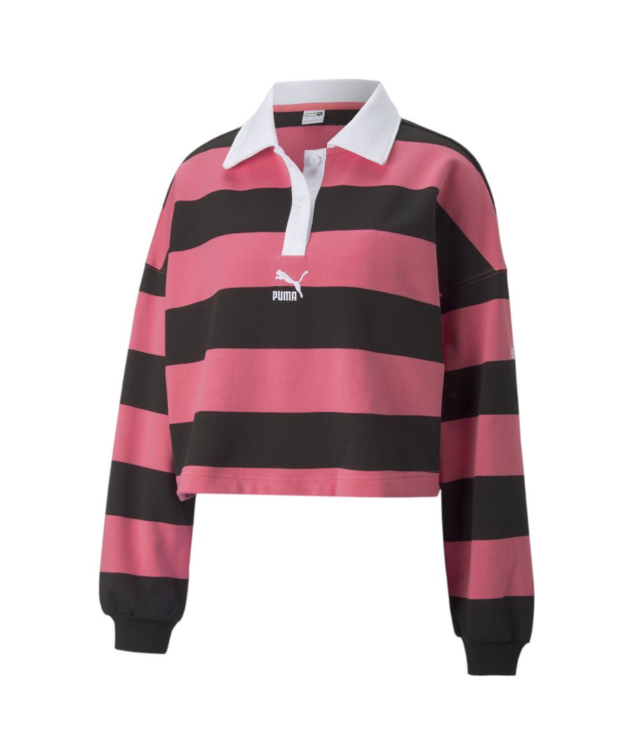 PRODUCT STORY A nod to PUMA's proud sportswear heritage, the SWxP collection adds urban influence to archival for a fresh and vibrant spin on more classic silhouettes. Featuring a bold, boxy and slightly cropped fit with a two-button placket, ribbed cuffs and standout striping, this rugby-inspired polo shirt is sure to turn heads. DETAILS Two-button placketRibbed cuffsPUMA Archive No. 1 Logo embroidered on chestPUMA branding embroidered on left sleeve