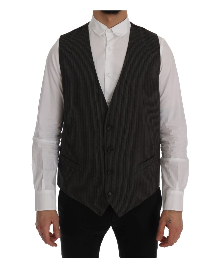 Dolce & ; Gabbana STFF Absolument époustouflant, 100% Authentique, neuf avec étiquettes Dolce & ; Gabbana STAFF Gilet Modèle : Gilet à simple boutonnage Couleur : Marron rayé Fermeture par boutons sur tout le devant Sangle arrière réglable à la taille Détails du logo Matière : 80% Coton, 20% Rayon Doublure : 63% Rayon, 37% Cupro