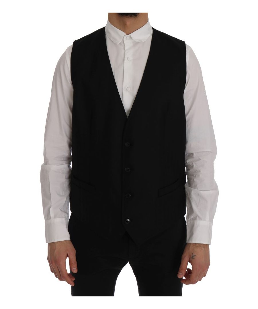 Dolce & ; Gabbana STAFF Absolument époustouflant, 100% Authentique, neuf avec étiquettes Dolce & ; Gabbana STAFF Gilet Modèle : Gilet à simple boutonnage Couleur : Noir Fermeture à boutons sur tout le devant Sangle arrière réglable Détails du logo Matériau : 97% laine, 3% élasthanne Doublure : 100% rayonne