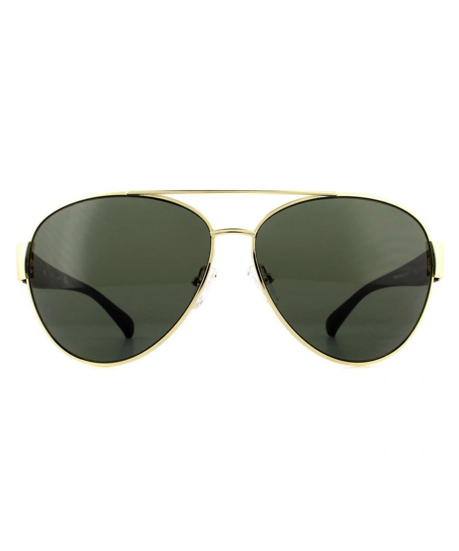 Guess zonnebril GU6830 32N Gold Green zijn een frame van hoge kwaliteit gemaakt van metaal en plastic met een vliegervorm en zijn ontworpen voor vrouwen