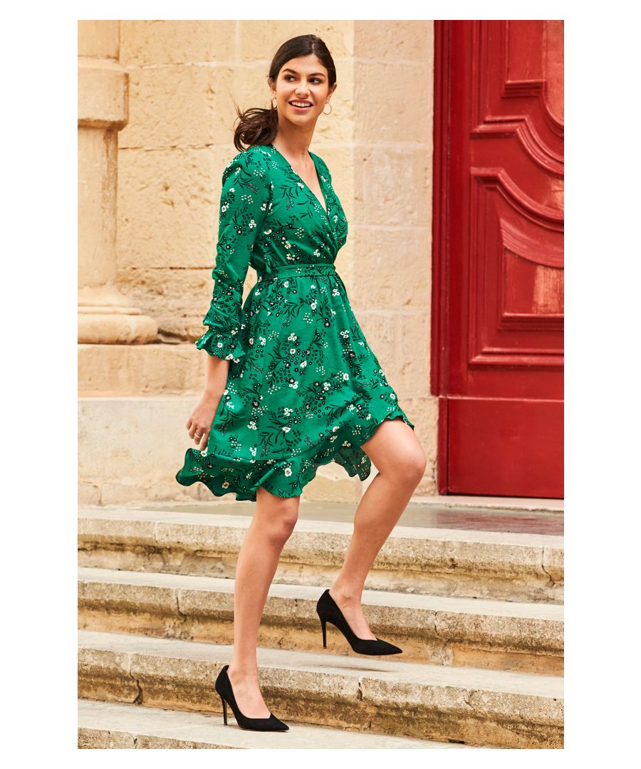 REASONS TO BUY: Product warning: will make your friends green with envyFresh new floral printSeriously flattering V-neck and belted waistRuffle cuffs and hem: it's all in the detailFrom birthday brunches to summer weddingsAccessorise with black courts and a clutch