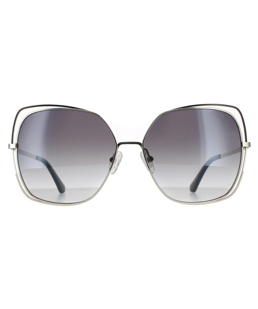Guess Butterfly Womens Shiny Light Nickeltin Smoke Mirror Sunglasses GU7638 are a sleek stylish butterfly style made from  lightweight metal. The adjustable nose pads and plastic temple tips allow for an all day comfortable fit. The Guess emblem logo features on the temples for brand authenticity