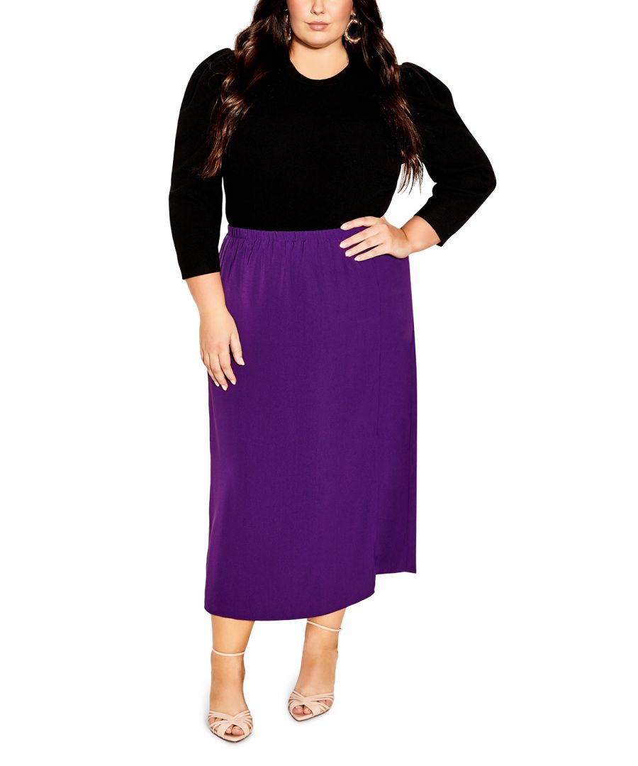 Pop some colour into your wardrobe with the petunia-hued Zoey Skirt! This flattering high-waisted skirt is perfect for dressing up or down. The elasticated waistband and relaxed fit make it incredibly comfortable to wear, while the flowy fabrication and midi length hemline give it a feminine touch. Whether you're headed to the office or out on the town, this skirt is sure to turn heads! Key Features Include: - Elasticated waistband - High waist fit - Pull up style - Fully lined - Relaxed fit - Soft flowy fabrication with subtle sheen - Midi length hemline