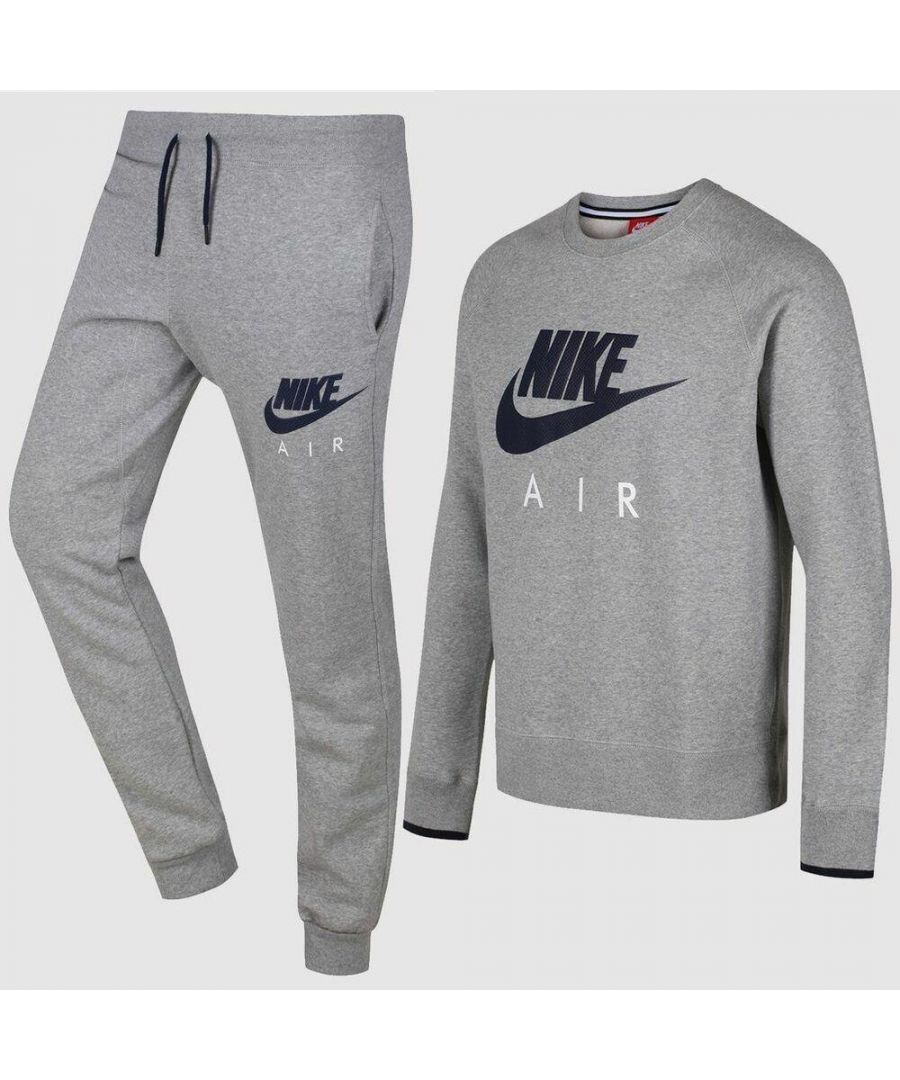 Nike Air Mens Sweatshirt Crewneck Full Fleece Tracksuit Grey.\nNike Crewneck Sweatshirt.\nRibbed Neckline and Cuffs.\nDetailed blue tipping on Sleeve Cuff End.\nBig Rubber Print Nike logo on Chest.\nSoft Feel Fabric.\n\nNike Air Jogger.\nElasticated Waist band.\nDrawstring to Front.\nRibbed Bottom leg cuffs for comfort fit.