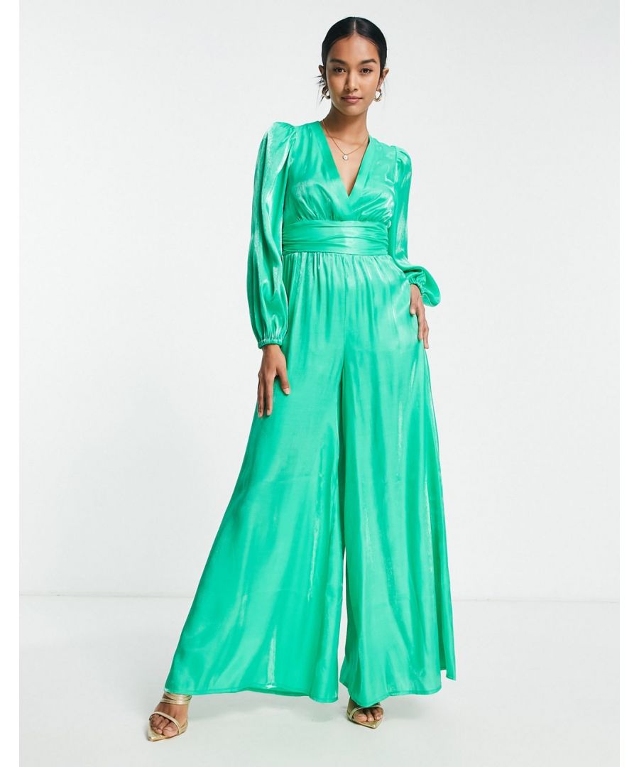 Jumpsuits & Playsuits by Topshop No need for a dress to impress V-neck Blouson sleeves Fitted waist Zip-back fastening Open back Wide leg Regular fit  Sold By: Asos