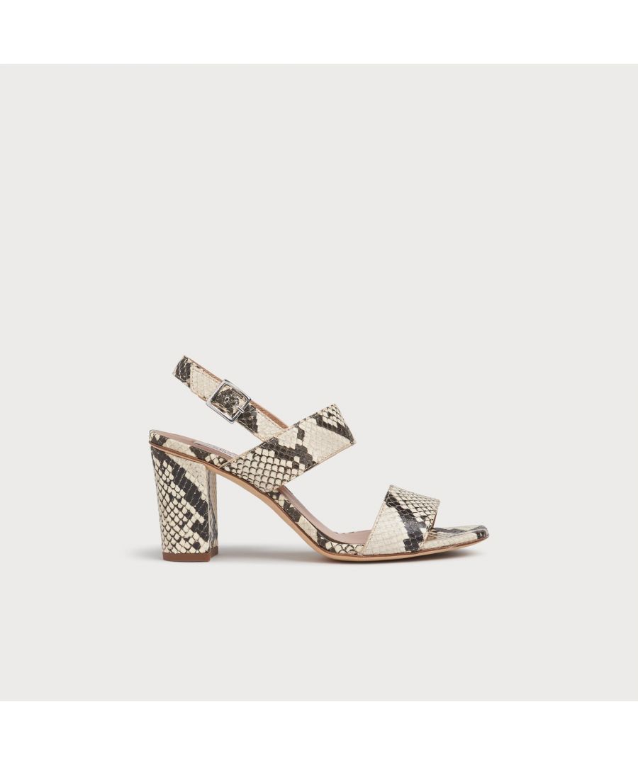 Our Rhiannon sandals are the perfect pair of wear-with-anything summer heels. Crafted in Italy from white and grey snake print leather, they have a double-strap design, a buckle-fastening back strap and a 70mm block heel. Swap your flats for these when you need a little height with your favourite summer skirts and dresses.