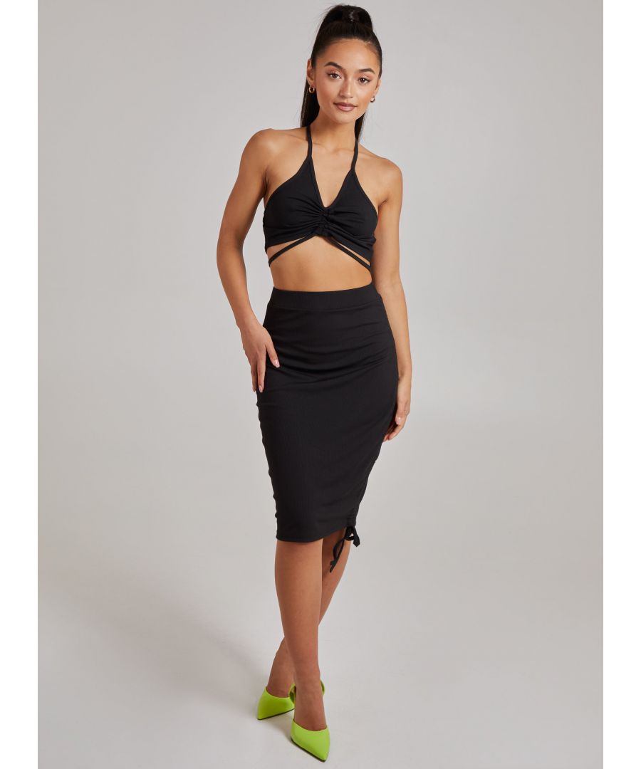 Flattering for every body shape, pair this little ruched midi skirt with it's matching crop top for a fun filled look!95% Polyester, 5% ElastaneMade in China Wash With Similar ColourDry FlatIron On ReverseModel wearing size SModel height: 5â€™6â€ / 167cm