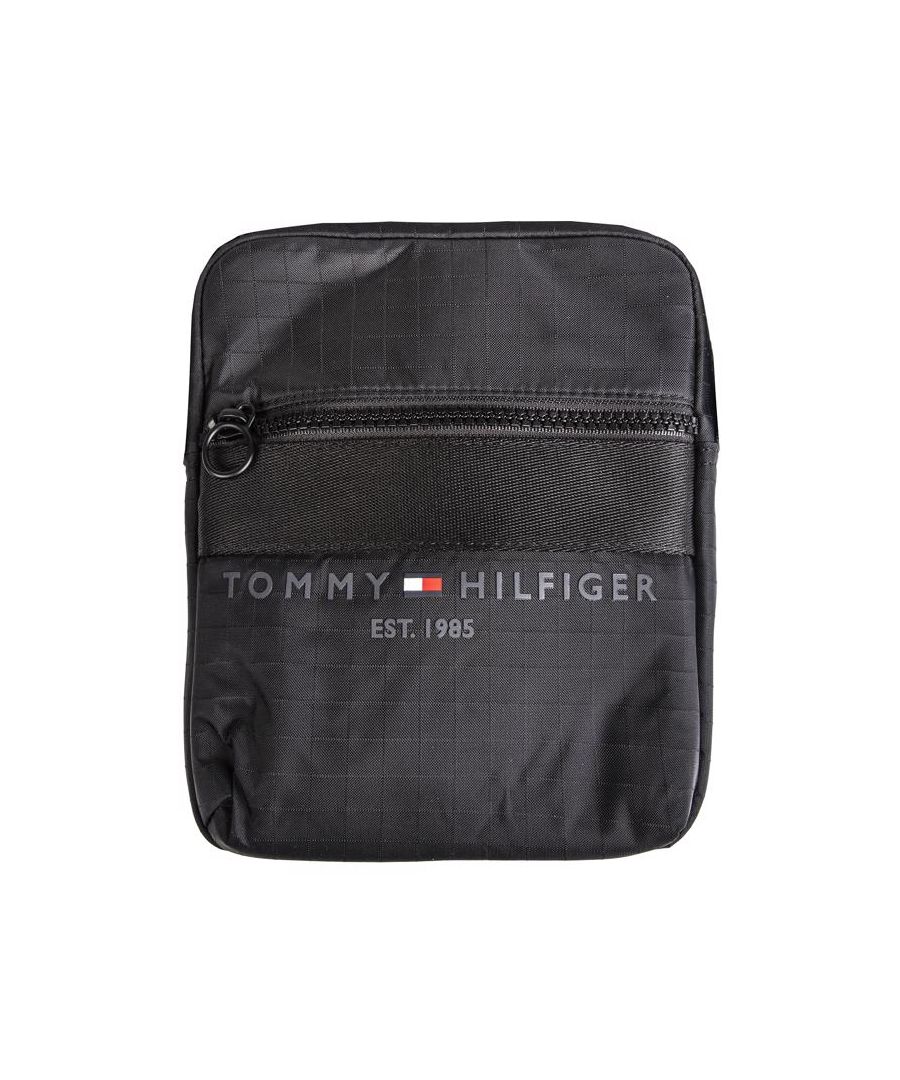 Mens black Tommy Hilfiger established reporter cross body bag, manufactured with nylon. Featuring: zip closure, water repellent, front zip compartment, adjustable shoulder strap and internal sections.