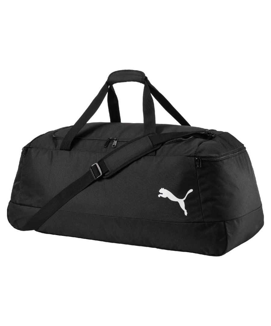 The Puma Pro Training II Large Holdall Bag works as a multi sport bag with essential storage as standard.  Made with a small carry handle, an adjustable shoulder strap.  Lareg main zip compartment.  Zipped side pockets.  Reinforced base with added Puma logo accent to outer.  Dimensions: 78cm H x 34cm W x 32 D.