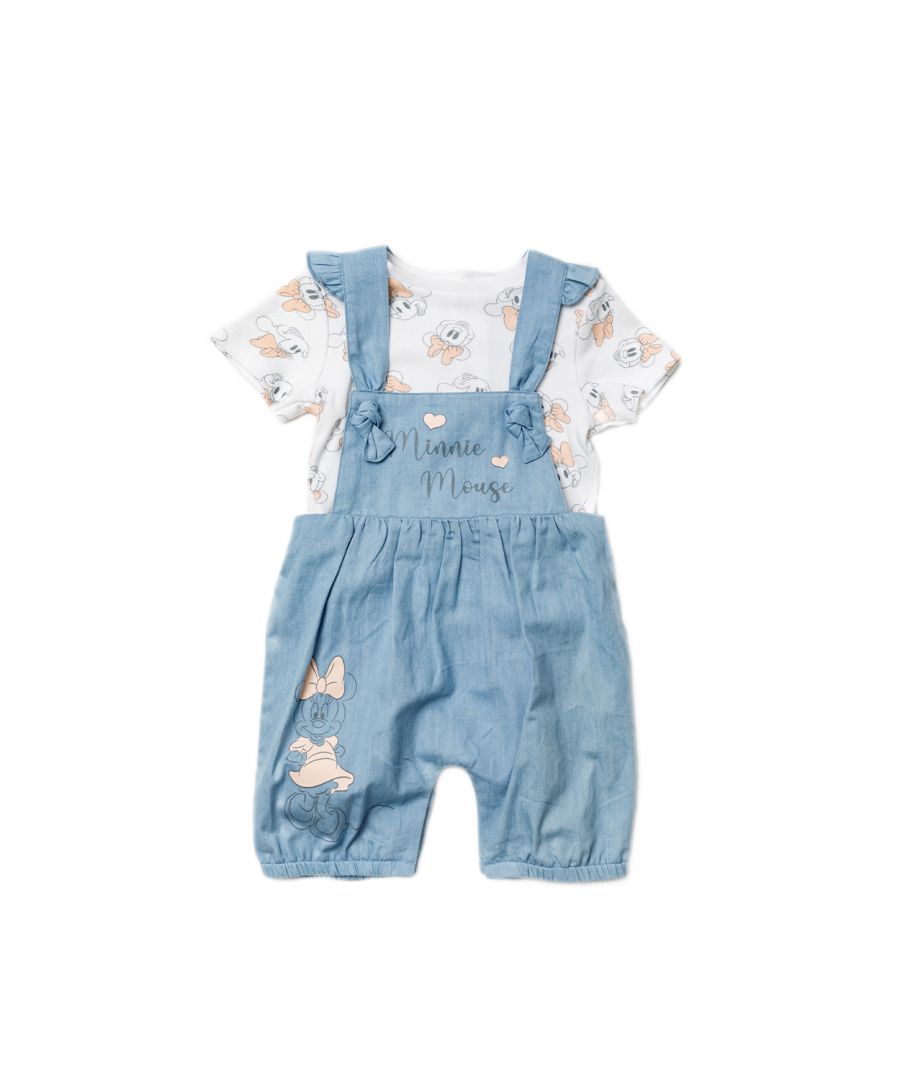 This adorable Disney Baby two-piece set features a Minnie Mouse print. The set comes with an all-over printed t-shirt and a pair of chambray style dungarees with bow details. Both the t-shirt and dungarees are cotton, and the t-shirt has popper fastenings, keeping your little one comfortable. This would make a lovely new addition to your little ones wardrobe!