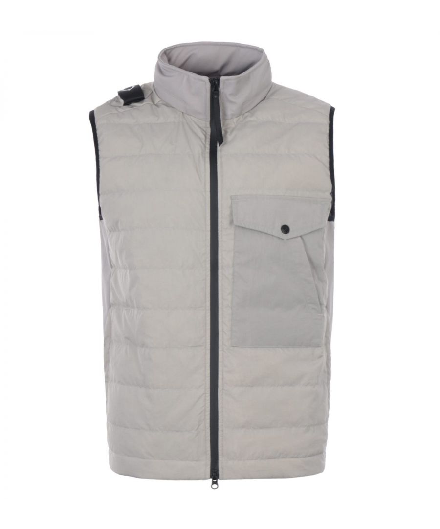 Masters of function and form, MA.Strum presents the softshell down quilt gilet. This versatile gilet perfectly combines functionality and style into the ultimate new season layering piece. Crafted from an innovative stretch softshell fabric with a down filled quilted nylon front. Featuring a stand collar with a zip away hood, two-way zip closure, twin zip side seam pocket and elasticated trims . Finished with the iconic detachable MA.Strum ID. Regular Fit, Stretch Softshell Fabric, Down Filled Quilted Nylon Front, Stand Collar with Zip Away Hood, Two-Way Zip Closure, Twin Zip Side Seam Pockets, Elasticated Trims, MA.Strum Branding. Style & Fit: Regular Fit, Fits True to Size. Composition & Care: Shell: 93% Polyester & 7% Elastane, Front: 100% Nylon, Fill: 90% Duck Down & 10% Duck Feathers, Machine Wash.