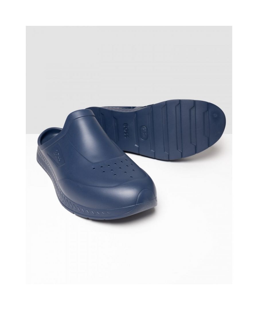 Modern clogs with trainer styling by BOSS. Featuring debossed branding at the side panel, these easy-wear sandals are crafted in full EVA for a lightweight and flexible feel. The insole is detailed with further BOSS branding.\nFastening top: Slip-onUnlined\nUpper material: 100% Ethylene vinyl acetate, 100% Ethylene vinyl acetate, Sole: 100% Ethylene vinyl acetate, Facing: 100% Ethylene vinyl acetate, Innersole: 100% Ethylene vinyl acetate\n50474973