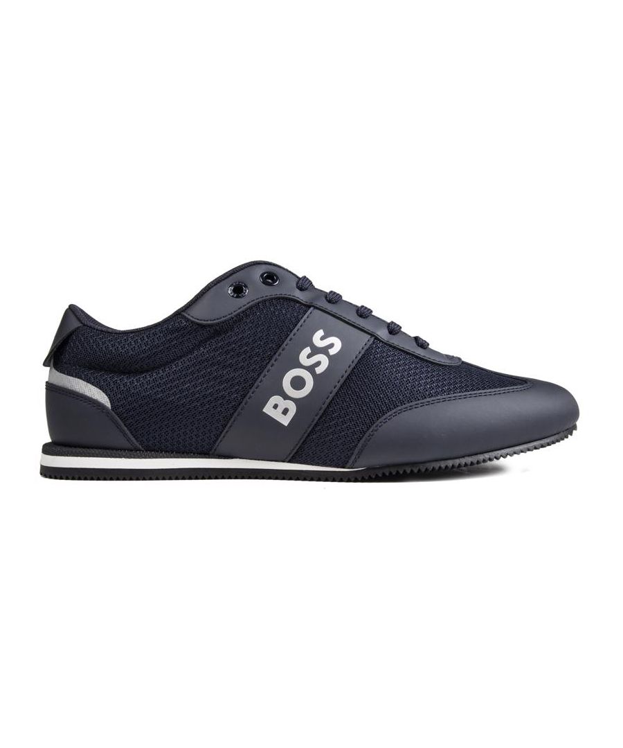 The Blue Rusham Low Trainer From Designer Boss Is Stylish Crafted In A High Quality Upper, With A Low Profile Sole And Signature Branding. These Designer Shoes Feature Branded Metal Eyelets And Padded Collar And Tongue. The Striking White Boss Logo Details Keep Things Luxe, While The Sleek Details Ensure You Make Your Mark Wherever You Go.