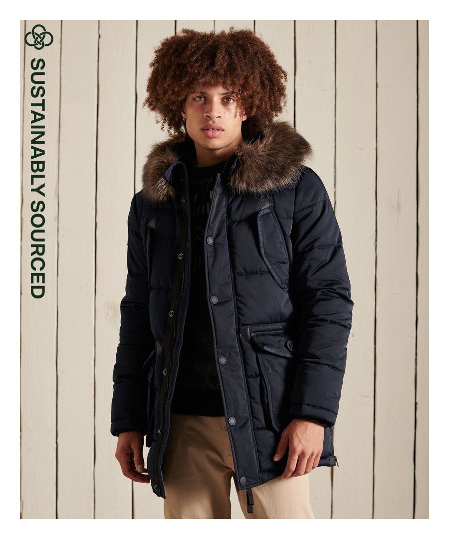 This versatile Chinook Parka provides you with all the practical and adjustable features you could need. Tailored to suit you and your needs, you can't go wrong with it. Inspired by American heritage, its authentic design will ensure you feel not only comfortable but classically stylish too.Relaxed fit – the classic Superdry fit. Not too slim, not too loose, just right. Go for your normal size.Adjustable hood with a bungee cord and poppersDetachable fur trimMain two-way zip and popper fasteningTwo breast popper pocketsTwo-button front pocketsTwo zip side pocketsRibbed cuffsLeather trimZip in side seamsTwo internal pockets - one with a hook and loop fasteningClassic Superdry leather tab