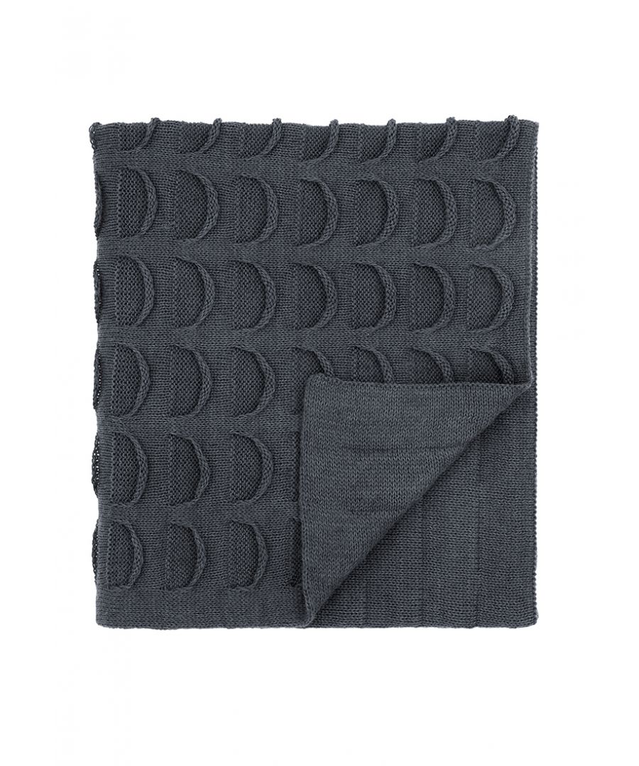 The chunky graphite knitted throw with all over pocket knit technique adds texture and cosiness